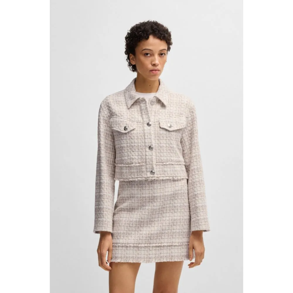 Cropped tweed jacket with metallic buttons
