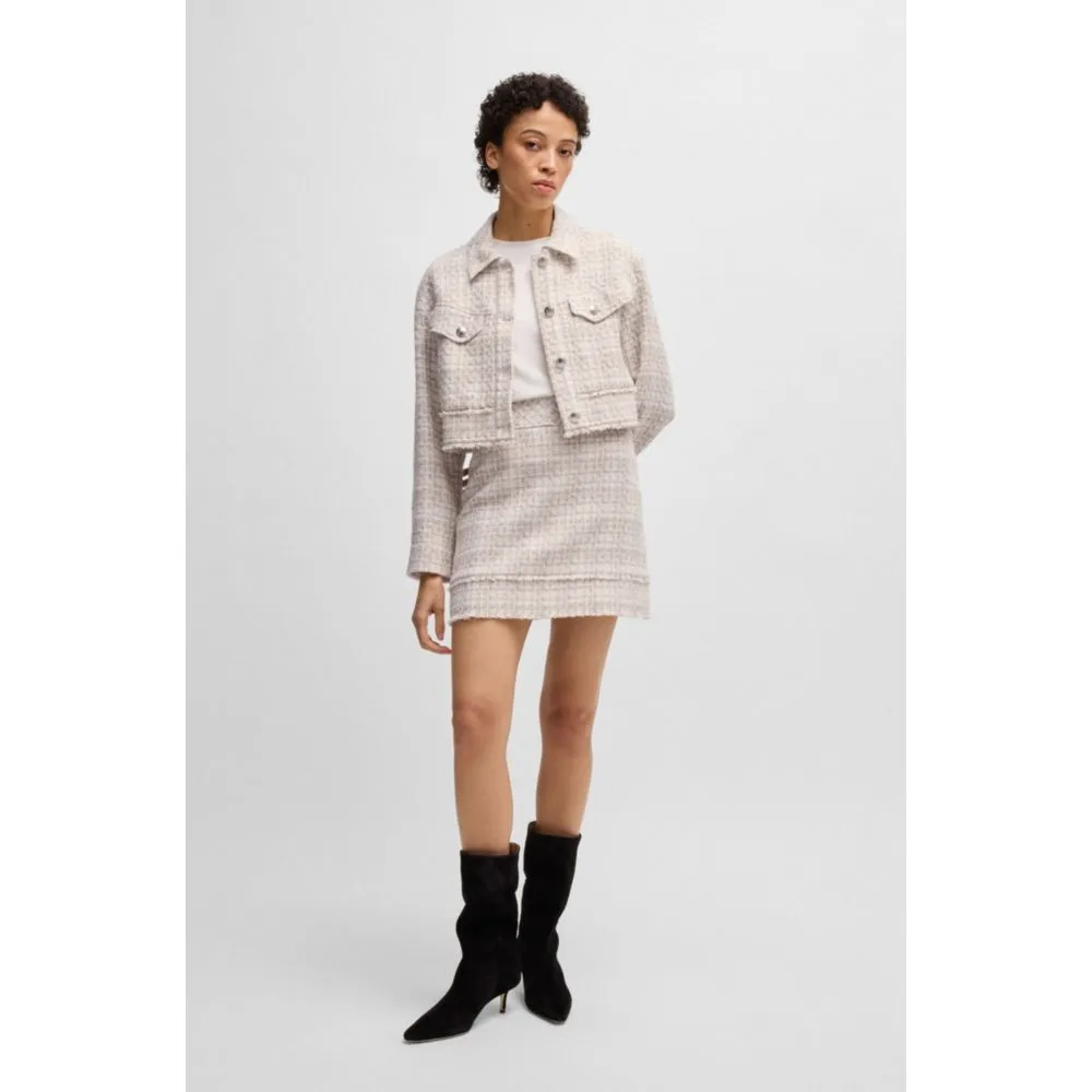 Cropped tweed jacket with metallic buttons
