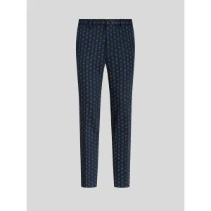 TROUSERS WITH TIE PRINT PATTERN